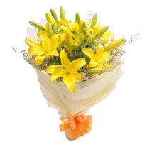 New Year Flowers to Delhi : Celebrate this New Year with yellow lily bouquet flower stems