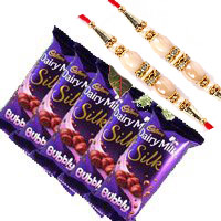 Order 5 Cadbury Silk Bubbly Chocolate With 3 White Roses with rakhi Delivery in Delhi