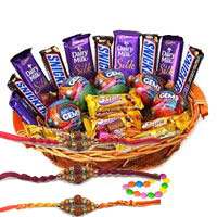 Online Rakhi Gift Delivery to Delhi that includes Cadbury Snicker Chocolate Basket on Rakhi