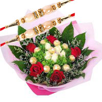 Send Rakhi Gifts to Delhi. Online 10 Pcs Ferrero Rocher with 10 Red White Roses Bouquet to Delhi
