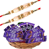 Place Order for Rakhi and Dairy Milk Basket 12 Chocolates With 12 Pink Roses in Delhi