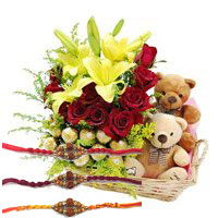 Rakhi Gifts Online to Delhi. 2 Lily 12 Roses 16 Ferrero Rocher Twin Small Teddy Basket