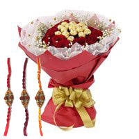 Best Rakhi and Chocolate to Delhi. 16 Pcs Ferrero Rocher encircled with 20 Red Roses to Delhi